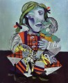 Hija de Maya Picasso con una muñeca cubismo de 1938 Pablo Picasso